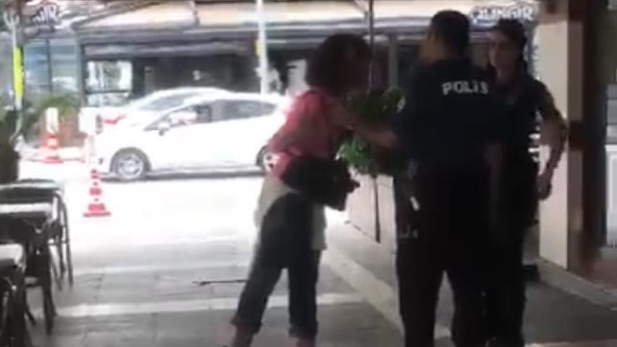 Adana’da, polise hakaretler yağdırıp ölümle tehdit eden kadın kamerada