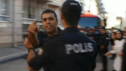 Yangın çekiminde muhabire tekmelerle saldıran polis kameraya böyle yansıdı