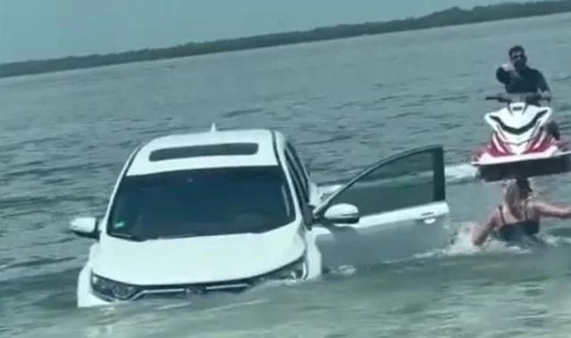 Jet ski’yi karaya çıkarmaya çalışırken arabası suya gömüldü
