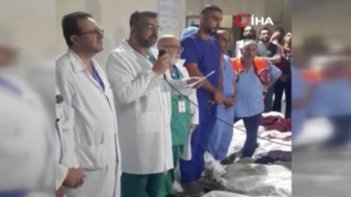 Filistinli doktor cenazelerin arasında basın toplantısı yaptı