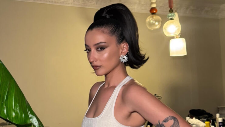 Melike Şahinin iddialı tarzı! Derin dekolteli kırmızı elbisesiyle göz kamaştırdı