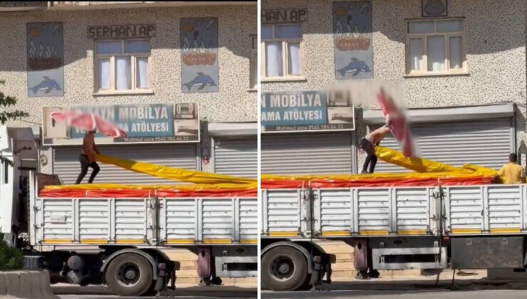 Kavurucu sıcakta beline bağladığı büyük boy şemsiye ile çalıştı