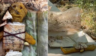 Mezarda bal mumundan yapılmış bebek ve muska bulundu