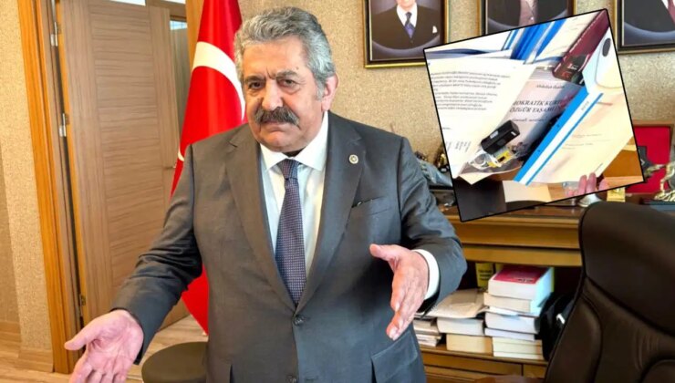 MHP’li Feti Yıldız’ın fotoğrafında dikkat çeken ayrıntı: Teröristbaşının yasaklı kitabı masasında