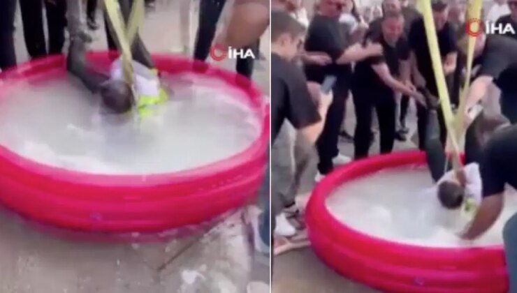Bursa’da ilginç görüntü: Damadı vinçte sallandırıp, suya soktular!