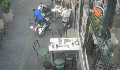 Elektrikli bisiklet yemek yiyenlerin arasına daldı