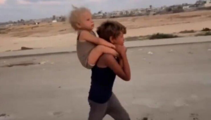 Gazze halkı zorla topraklarından sürülüyor: Sırtında taşıdığı kardeşiyle ağlayarak göç etti