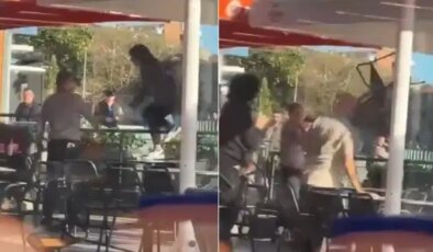 Restoranda ‘sandalyeli’ kavga: Masaya atladı kayarak düştü!