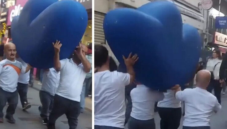 Vatandaşlar şaşkınlıkla izledi! Bir grup cüce cadde boyunca “F” harfi taşıdı