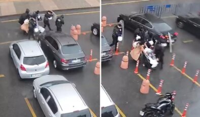 Polisler, anne ve bebeğini fırtınadan kalkanla korudu