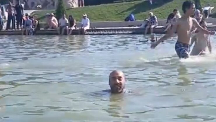 Eyfel Kulesi’nin yanındaki süs havuzunda yüzme keyfi