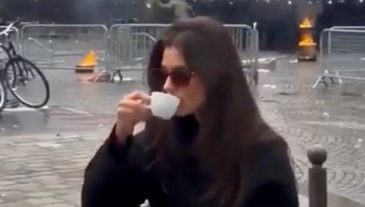 Fransa’da protestolar büyüdü: Keyifle kahvesini yudumlayan turist, olaylara aldırış etmedi